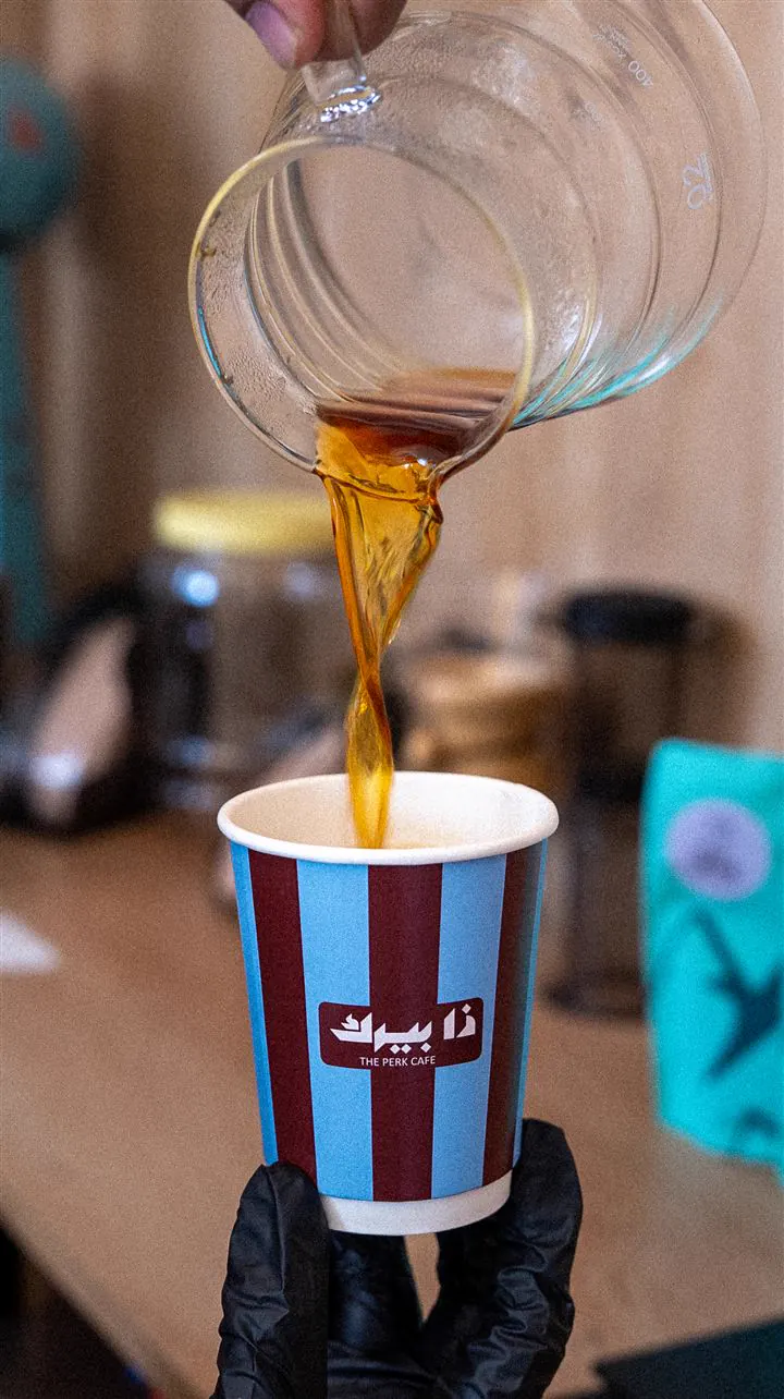 The Perk Cafe: espresso poured over milk