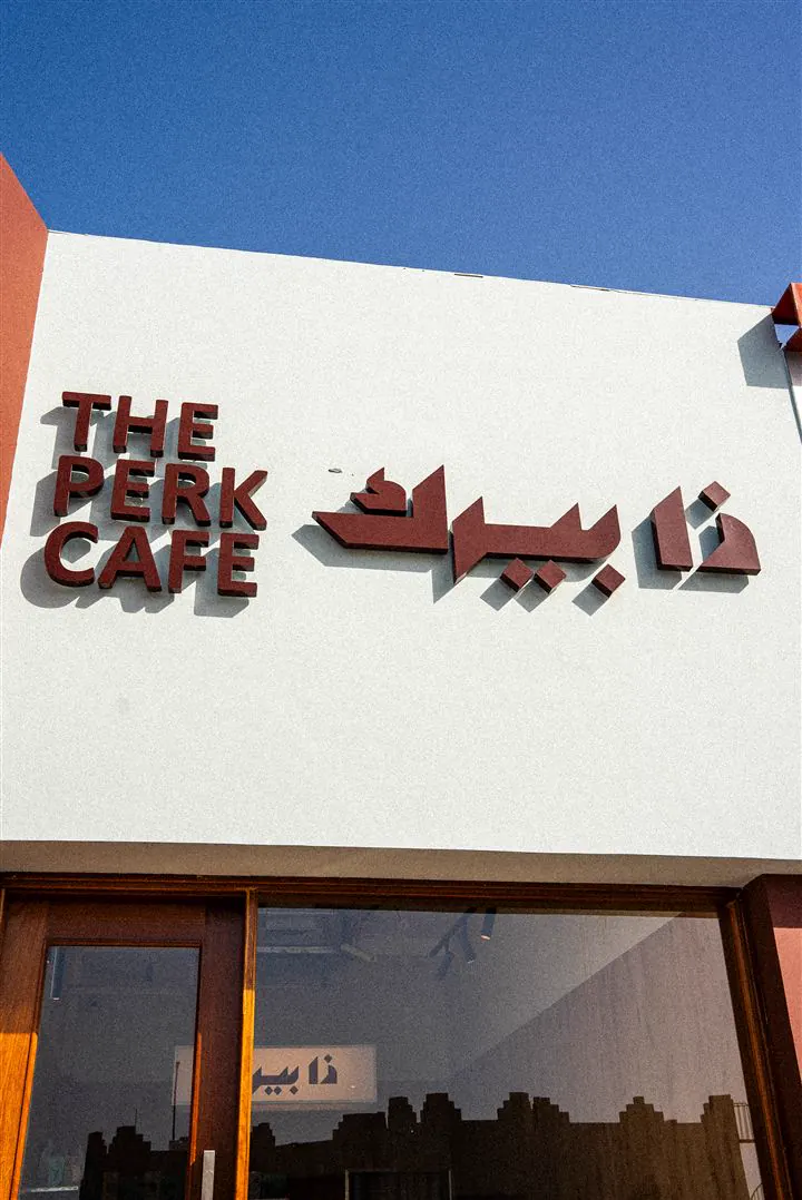 The Perk Cafe storefront sign